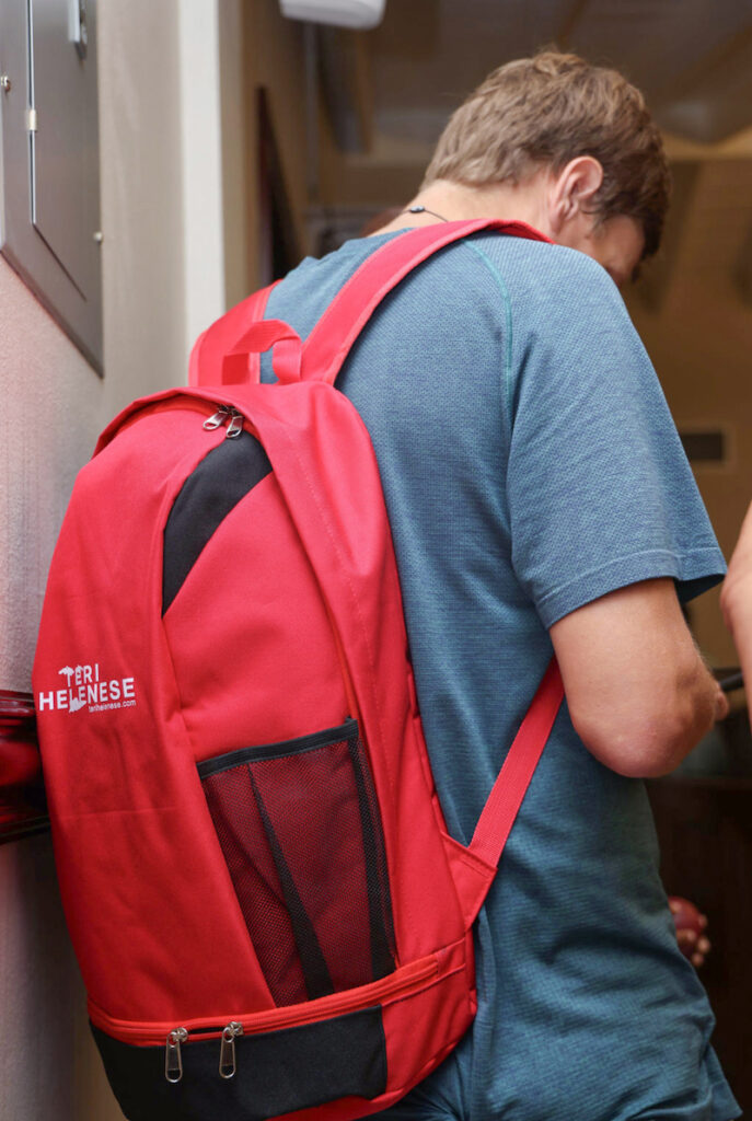 A St. John participant strapped and zipped his bookbag and is ready for the 2024 hurricane season